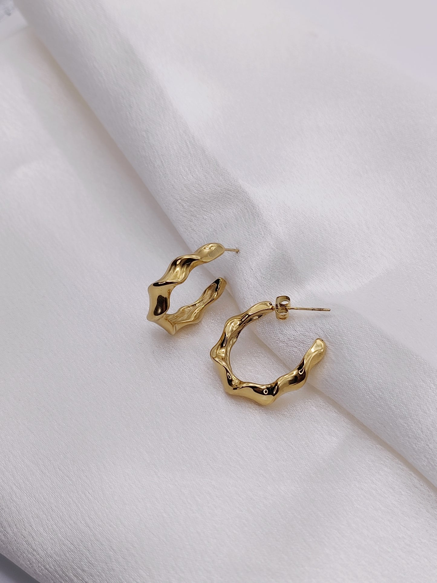 Boucle d'oreille torsadé